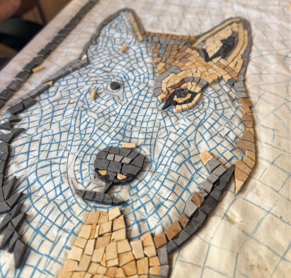Wolf cartoon and stone detail